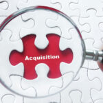 missing puzzle piece with the word acquisition