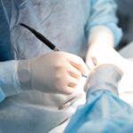 a veterinary surgeon makes an incision